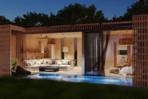 Skyline Ubud 1BR pool villa at night, living area open to private pool